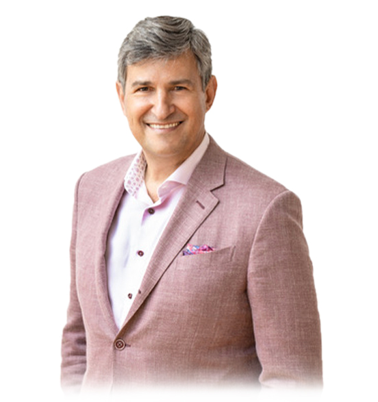 Dr. Gantous in a rose colour suit
